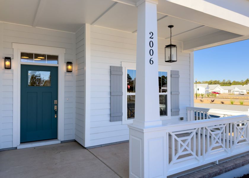 Exterior details and patio area of a home in The Sanctuary at Sunset Beach, Sunset Beach (Image 3).