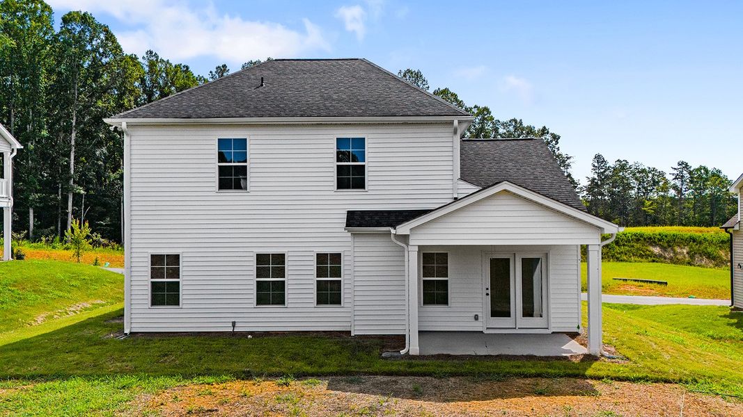 Front exterior of a new home in Brooke Hill, Lewisville, NC, highlighting curb appeal (Image 27). Front exterior of a new home in Brooke Hill, Lewisville, NC, highlighting curb appeal (Image 27).