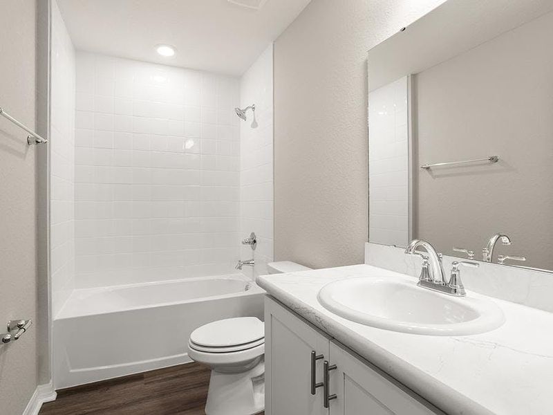 Secondary bedrooms share a convenient hall bath. Secondary bedrooms share a convenient hall bath.
