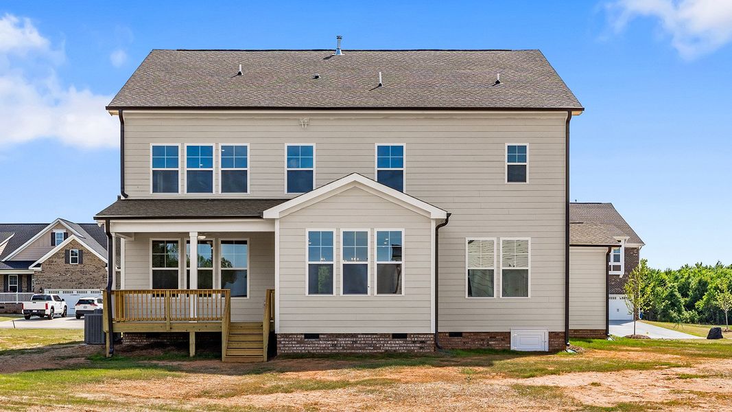Exterior details and patio area of a home in Lilah Grove, Summerfield (Image 23).