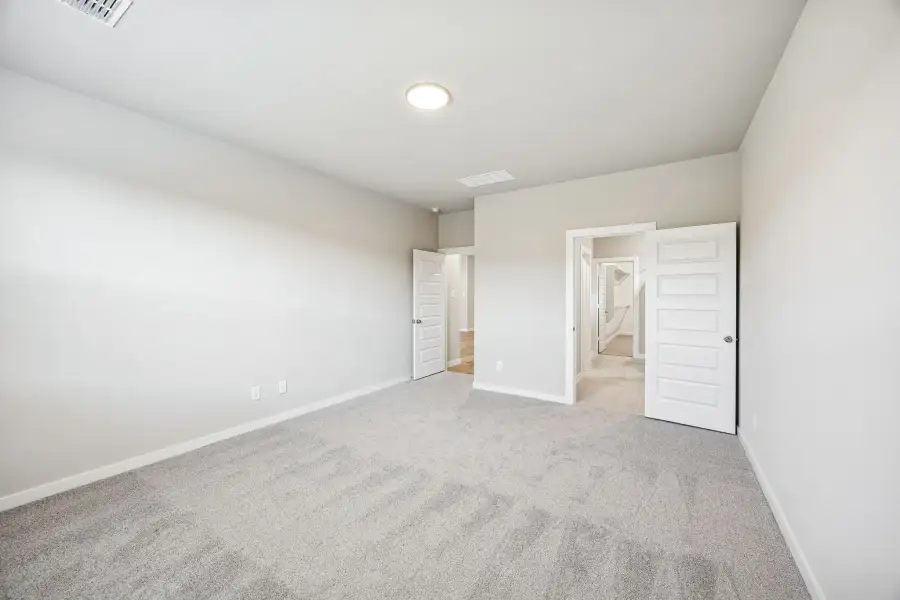 Primary Suite in the Willow home plan by Trophy Signature Homes – REPRESENTATIVE PHOTO Primary Suite in the Willow home plan by Trophy Signature Homes – REPRESENTATIVE PHOTO