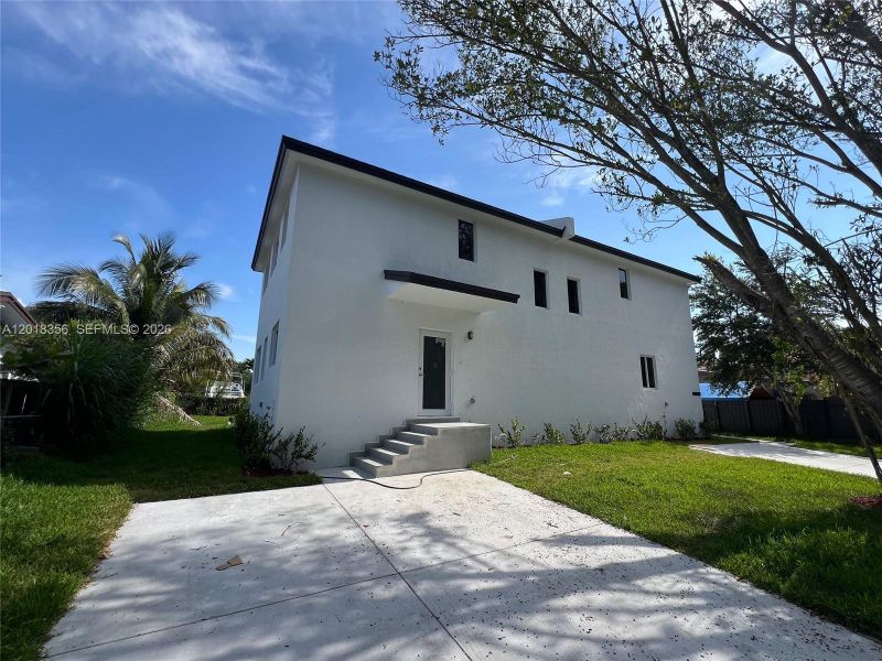Exterior details and patio area of a home in , Miami (Image 1). Exterior details and patio area of a home in , Miami (Image 1).
