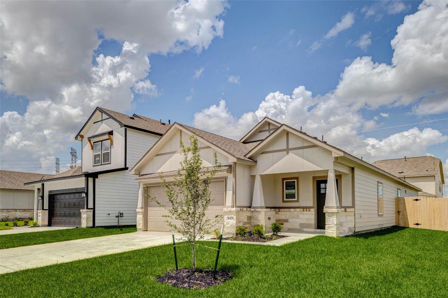 Beautiful curb appeal welcomes you home with a fresh, modern exterior, charming gable details, stone accents, and a manicured front lawn. The covered entry, attached garage, and clean architectural lines create a warm first impression, while the bright sky and open surroundings highlight the home’s inviting presence and move-in-ready feel. Beautiful curb appeal welcomes you home with a fresh, modern exterior, charming gable details, stone accents, and a manicured front lawn. The covered entry, attached garage, and clean architectural lines create a warm first impression, while the bright sky and open surroundings highlight the home’s inviting presence and move-in-ready feel.