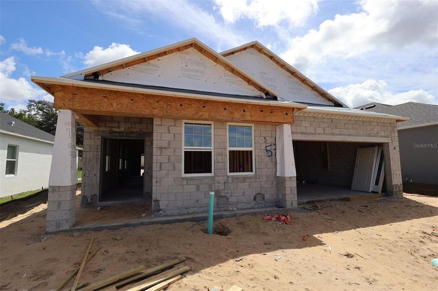 In-progress construction of a new home in Emerson Pointe, Apopka, FL (Image 25).