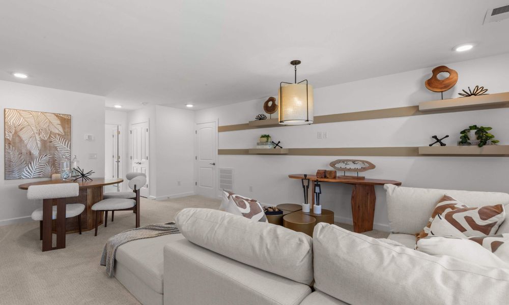 Representative furnished interior of a home built from the The Shorebreak by Chesapeake Homes in The Willows, Loris (Image 40).