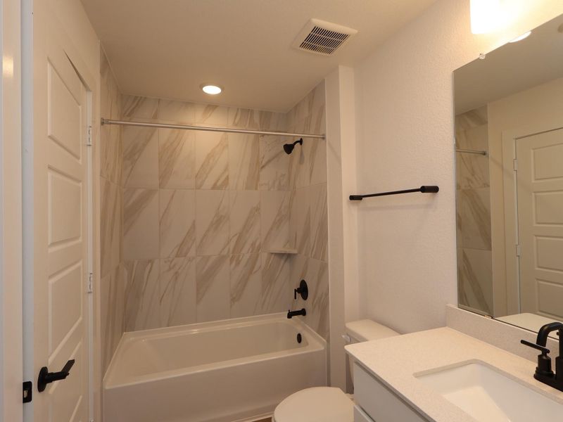 Furnished interior view inside a new home in Sorella, Tomball (Image 6).