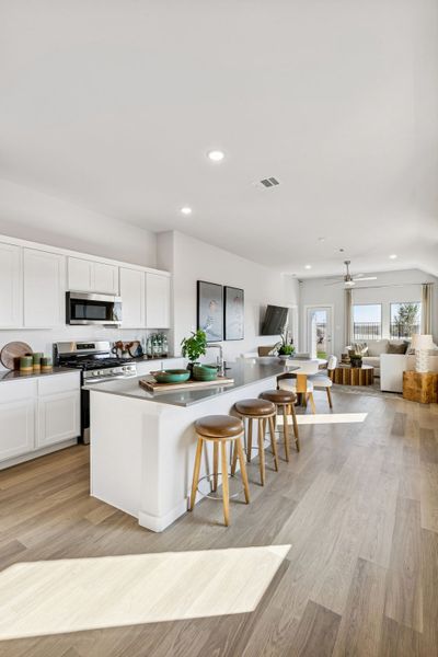 Kitchen in a Nicholson Ranch Magnolia Model Home in Lavon TX by Trophy Signature Homes