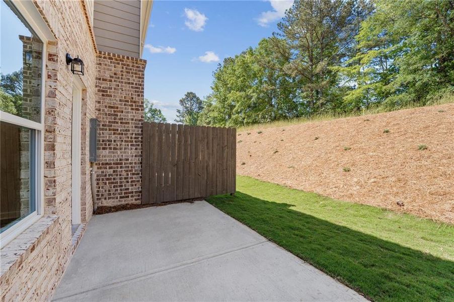 Exterior details and patio area of a home in Wildwood Place, Powder Springs (Image 4).