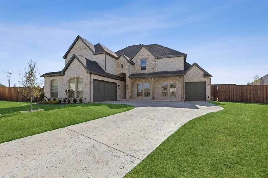 Front exterior of a new home in Cambridge Estates, Prosper, TX, highlighting curb appeal (Image 26).