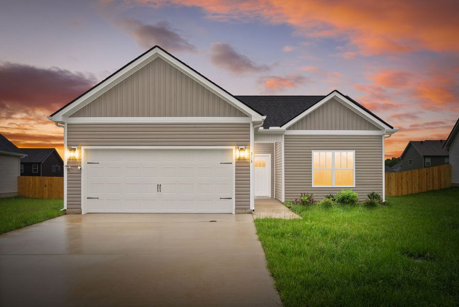 Front exterior of a new home in Cherry Fields, Clarksville, TN, highlighting curb appeal (Image 1). Front exterior of a new home in Cherry Fields, Clarksville, TN, highlighting curb appeal (Image 1).