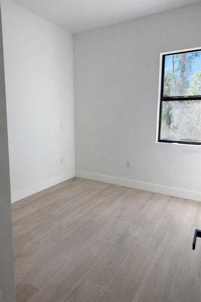 Spacious, unfurnished interior of a new home in , Port Charlotte (Image 18).