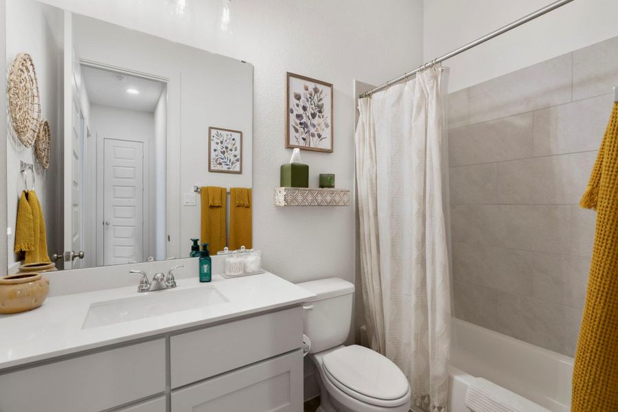 Furnished interior view inside a new home in The Colony, Bastrop (Image 18).