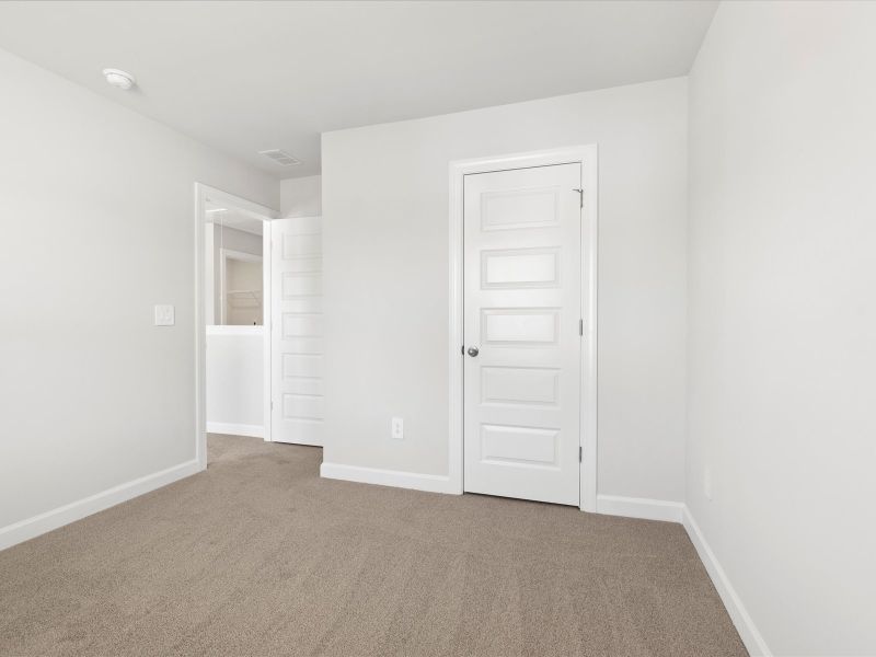 Spacious, unfurnished interior of a new home in The Farm at Wells Creek - Signature Collection, Gray Court (Image 21).