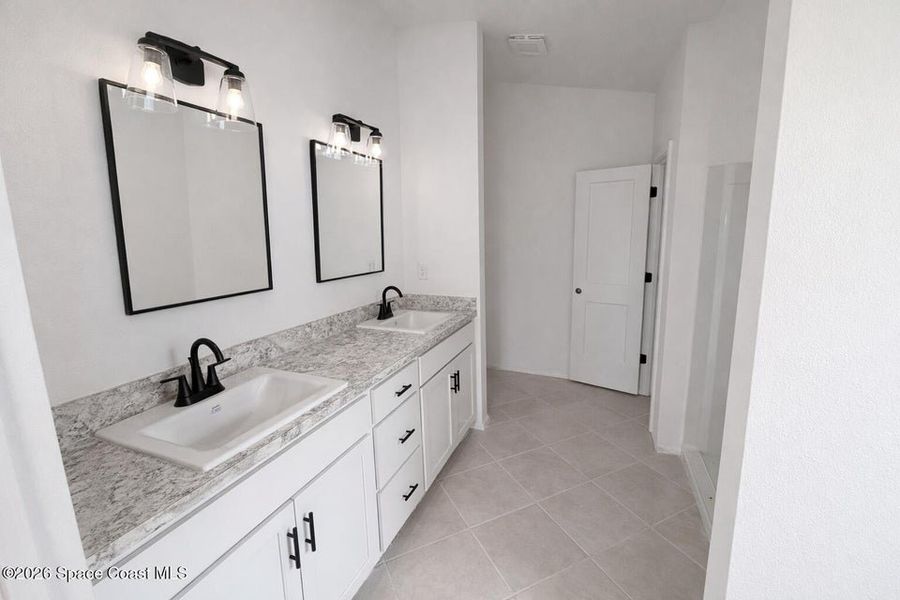 Furnished interior view inside a new home in St. John's Preserve, Palm Bay (Image 9).