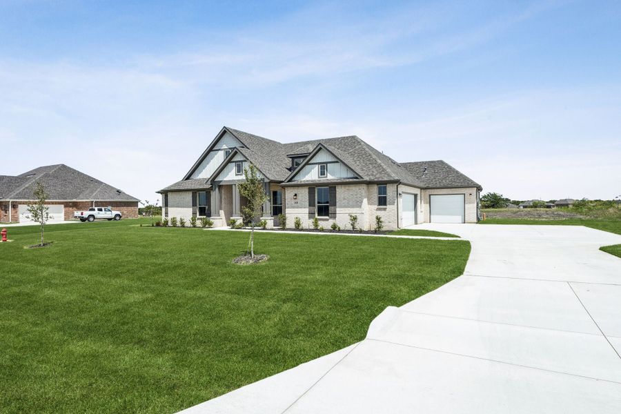 Representative exterior photo of a completed home built from the Verona by Centre Living Homes in Ellis Ranch Estates, Waxahachie, TX (Image 2). Representative exterior photo of a completed home built from the Verona by Centre Living Homes in Ellis Ranch Estates, Waxahachie, TX (Image 2).
