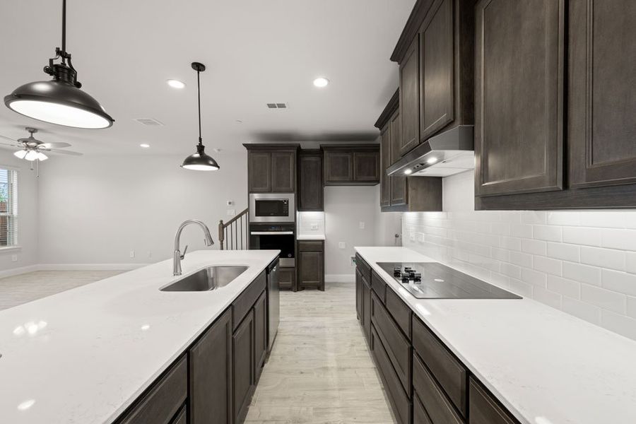 Representative exterior photo of a completed home built from the Bridgeport by Impression Homes in Main Street Village, Mansfield, TX (Image 8). Representative exterior photo of a completed home built from the Bridgeport by Impression Homes in Main Street Village, Mansfield, TX (Image 8).