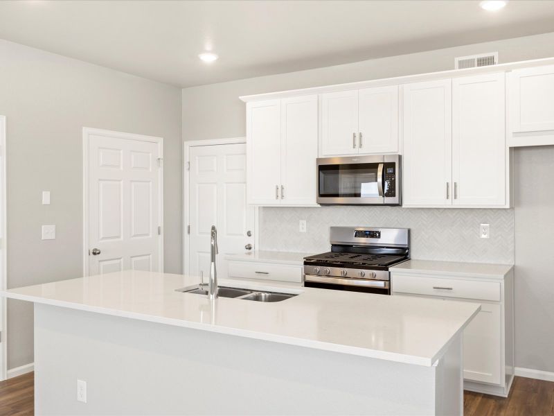 The Woodland floorplan interior image taken at a Meritage Homes community in Aurora, CO.