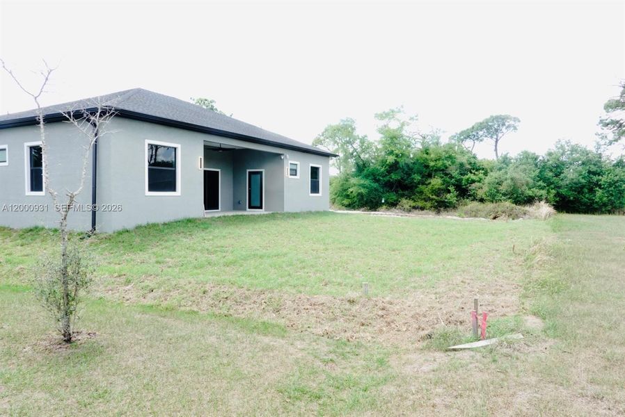Exterior details and patio area of a home in , Port Charlotte (Image 3).