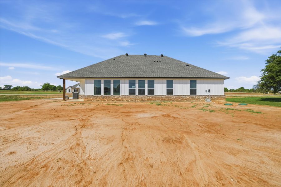 Front exterior of a new home in Zion Valley, Poolville, TX, highlighting curb appeal (Image 15). Front exterior of a new home in Zion Valley, Poolville, TX, highlighting curb appeal (Image 15).