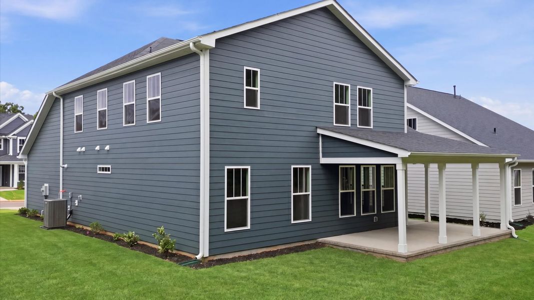Established charm meets functional outdoor living with a spacious rear covered porch