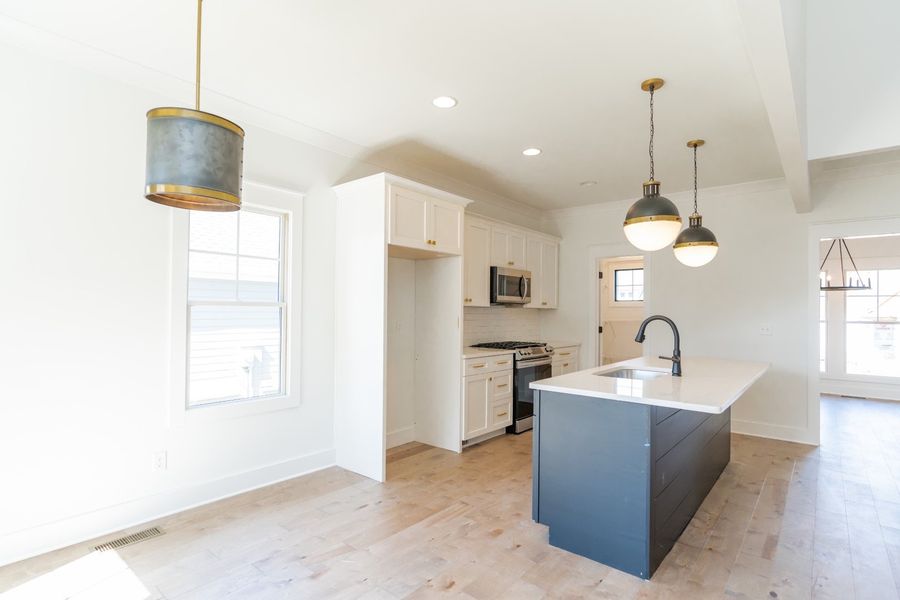 Furnished interior in a model home at Baker Road in Birchwood (Image 20).