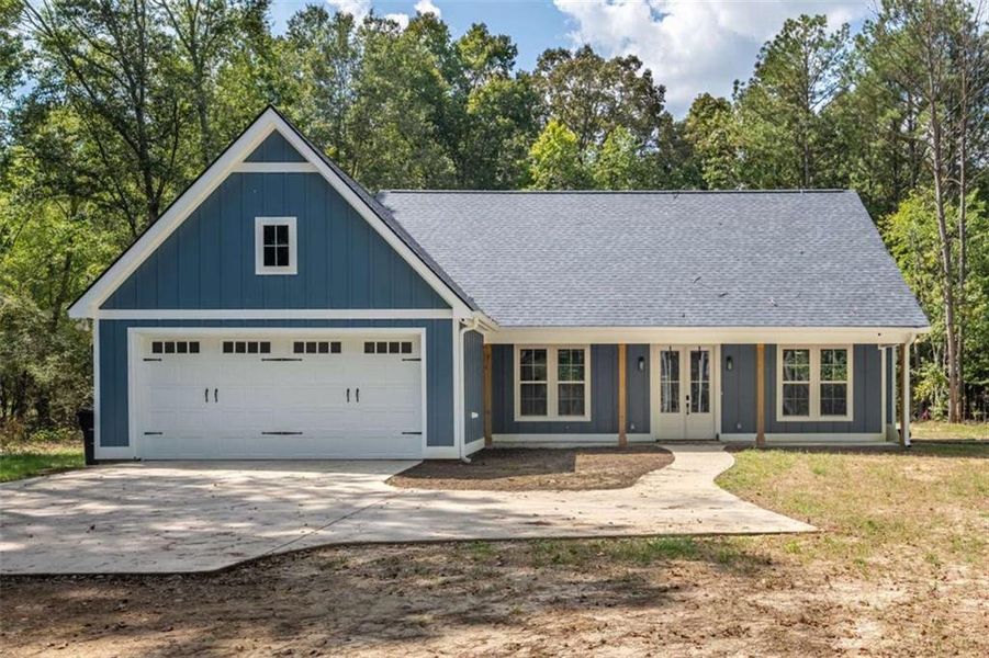 Front exterior of a new home in , Rome, GA, highlighting curb appeal (Image 1). Front exterior of a new home in , Rome, GA, highlighting curb appeal (Image 1).