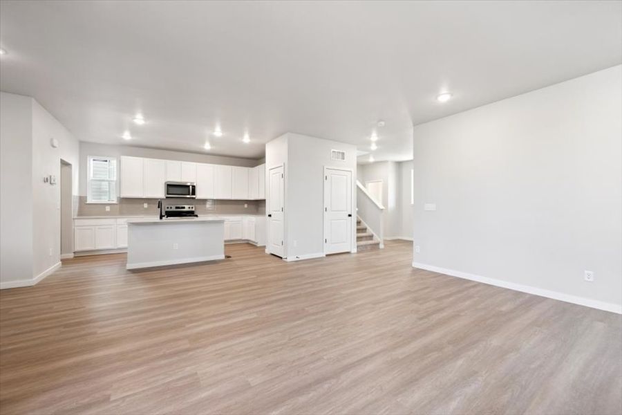 A large empty kitchen. A large empty kitchen.