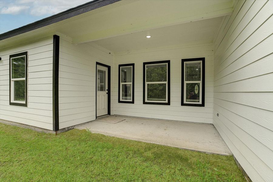 Exterior details and patio area of a home in , Kenefick (Image 4).