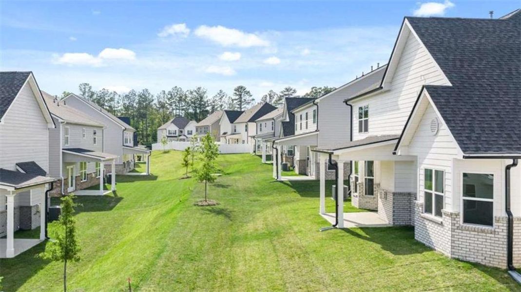 Exterior details and patio area of a home in Wildwood, Covington (Image 23). Exterior details and patio area of a home in Wildwood, Covington (Image 23).