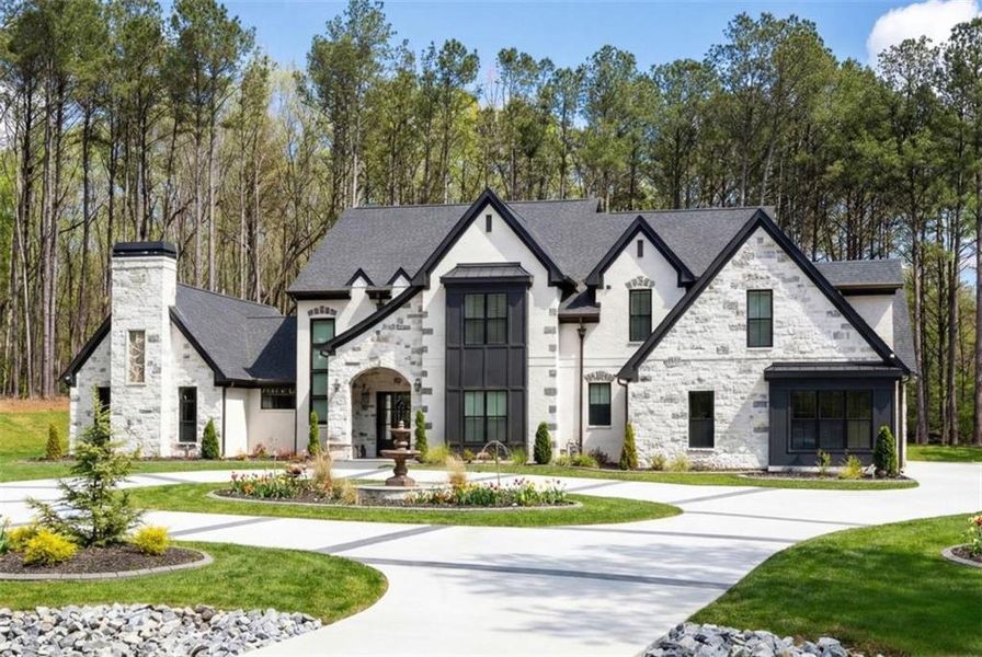 Front exterior of a new home in , Tyrone, GA, highlighting curb appeal (Image 2). Front exterior of a new home in , Tyrone, GA, highlighting curb appeal (Image 2).