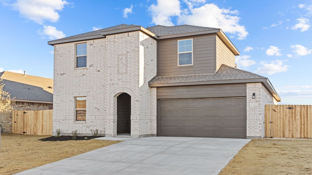 Representative exterior photo of a completed home built from the ROSEMONT by D.R. Horton in Homestead at Parks Bell Ranch, Odessa, TX (Image 4).