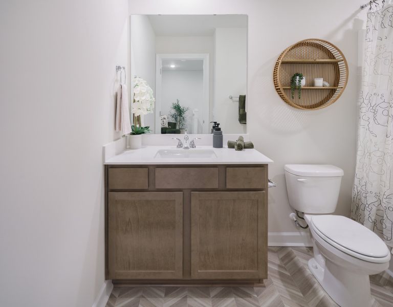 Representative furnished interior of a home built from the The Carson by Cothran Homes in Reidville Town Center, Reidville (Image 17).