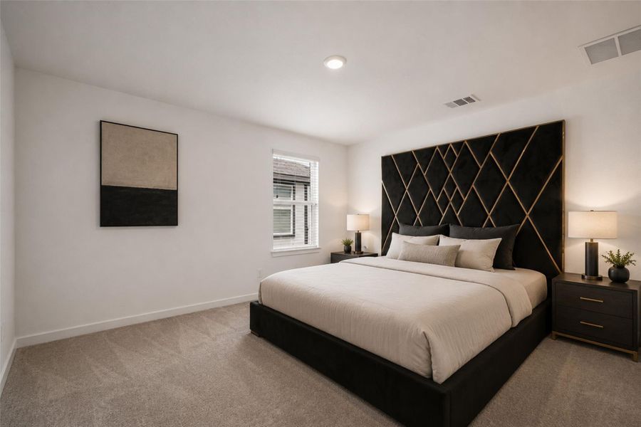 Primary bathroom featuring a spacious walk-in shower with tile surround, built-in shower niche, and natural light. Direct access to the primary closet for added convenience and functionality. Clean, bright layout with additional built-in storage shelving.