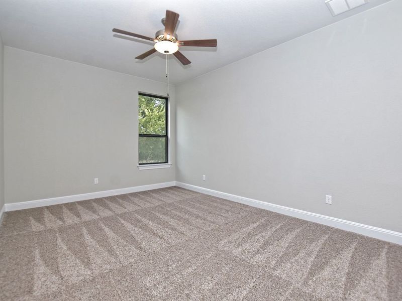 Representative unfurnished interior of a home built from the Madera II by Giddens Homes in Scofield Farms Estates, Georgetown (Image 311).