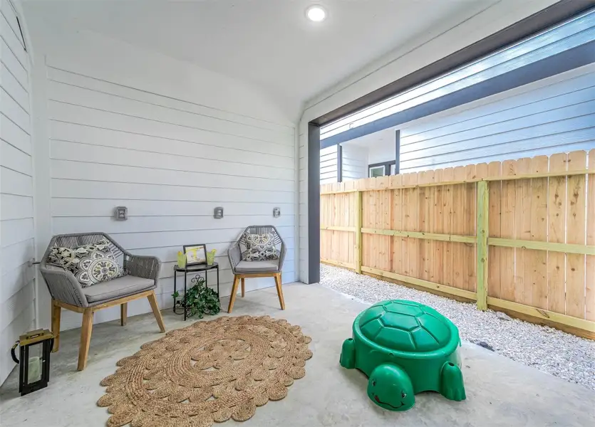 Exterior details and patio area of a home in , Houston (Image 19). Exterior details and patio area of a home in , Houston (Image 19).