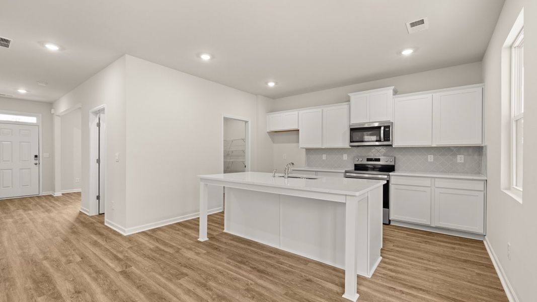 Representative furnished interior of a home built from the Galen by D.R. Horton in Jackson Landing, Jefferson (Image 7).