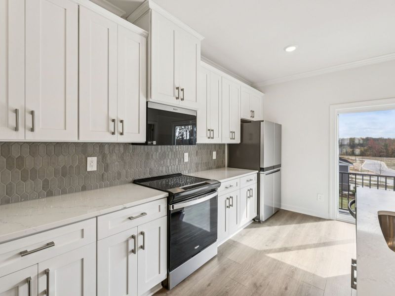 Furnished interior view inside a new home in Meadows at Wilson Farms - The Heights Series, Fort Mill (Image 5). Furnished interior view inside a new home in Meadows at Wilson Farms - The Heights Series, Fort Mill (Image 5).