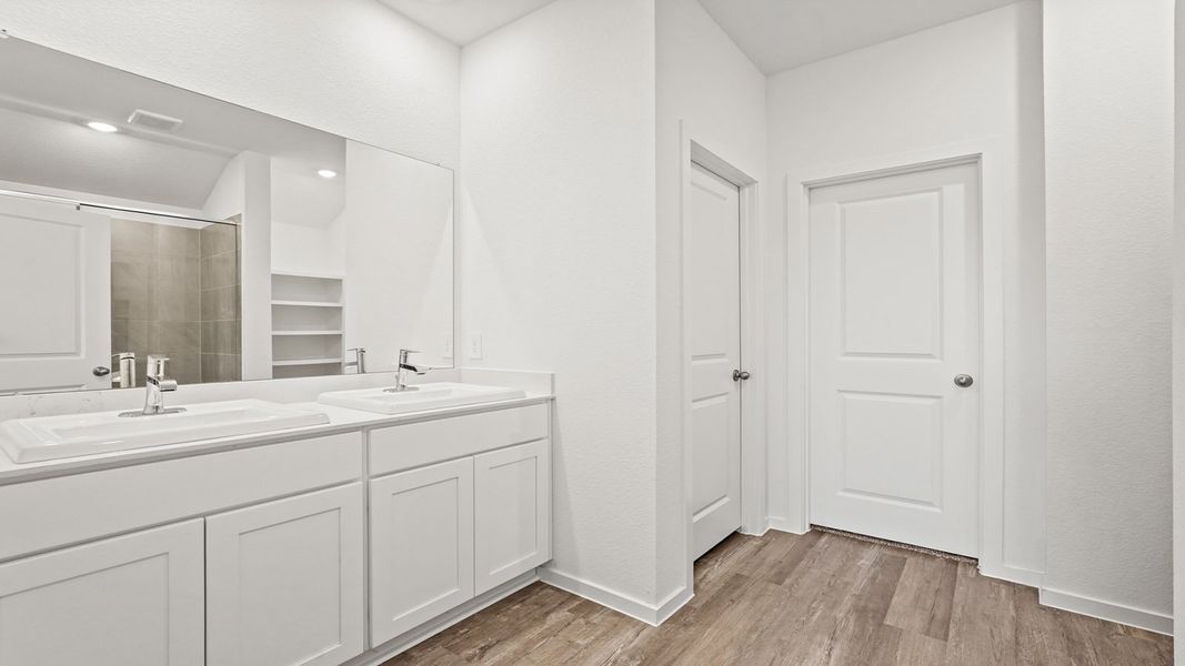 Furnished interior view inside a new home in Sunterra, Katy (Image 9).