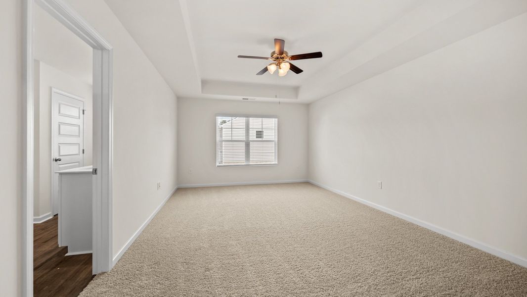 Representative unfurnished interior of a home built from the Salisbury by D.R. Horton in Inverness at Sugarloaf, Lawrenceville (Image 26).