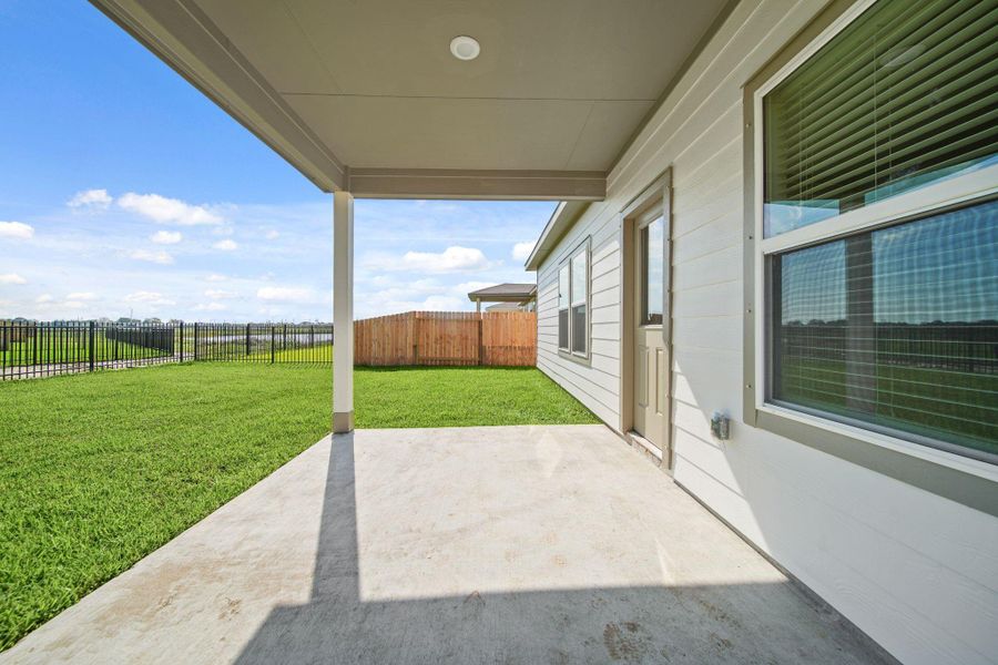 Exterior details and patio area of a home in Russell Ranch, Bay City (Image 19).