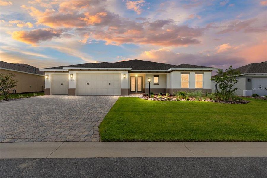 Front exterior of a new home in On Top of the World Communities, Ocala, FL, highlighting curb appeal (Image 1). Front exterior of a new home in On Top of the World Communities, Ocala, FL, highlighting curb appeal (Image 1).