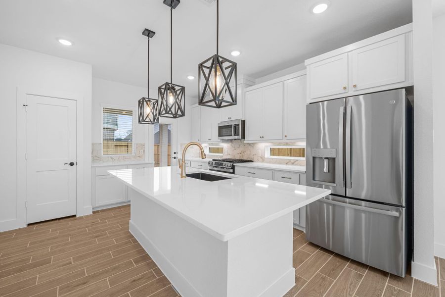 Furnished interior view inside a new home in Sienna, Missouri City (Image 8).