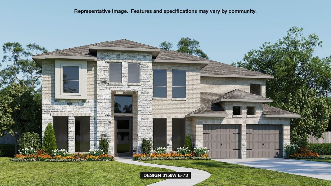 View of front of property with a garage and a front lawn