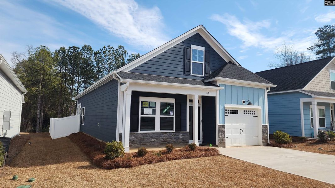 Front exterior of a new home in Bickley Station, Irmo, SC, highlighting curb appeal (Image 20).