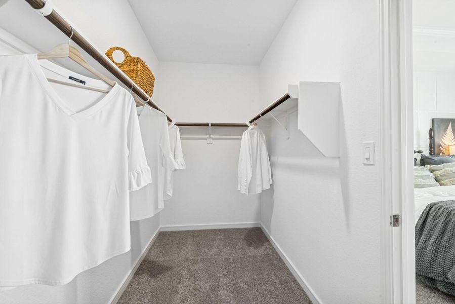 Large walk-in closet in the primary suite (*Photo not of actual home and used for illustration purposes only.)