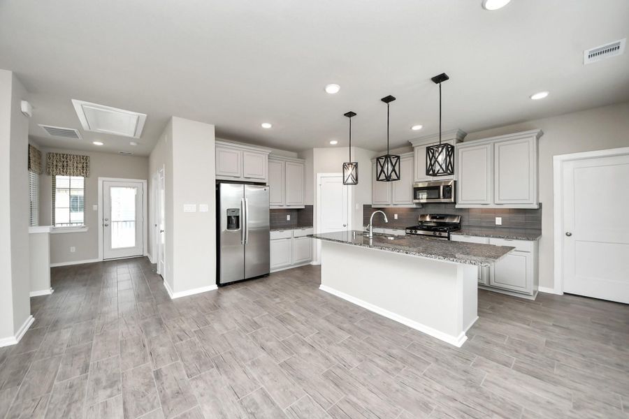 Furnished interior view inside a new home in The Groves, Humble (Image 5).