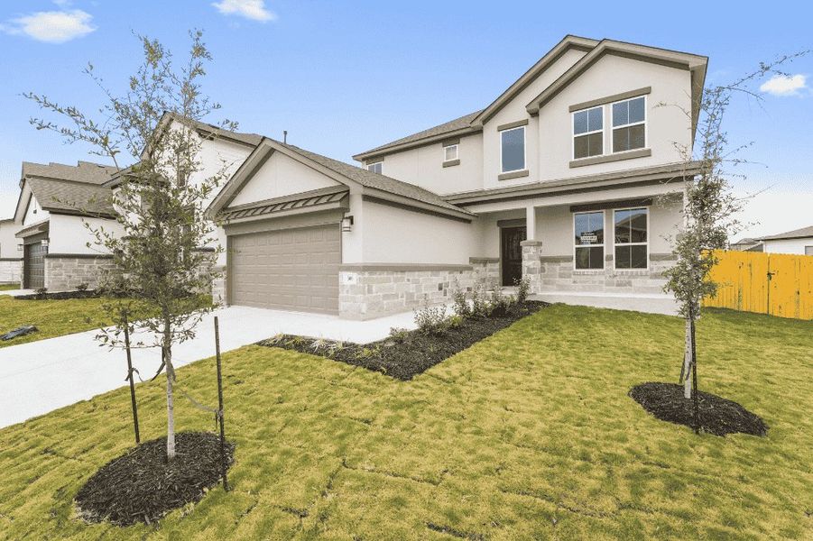 Representative exterior photo of a completed home built from the Bennigton 2434 S by Saratoga Homes in Morningstar, Georgetown, TX (Image 2). Representative exterior photo of a completed home built from the Bennigton 2434 S by Saratoga Homes in Morningstar, Georgetown, TX (Image 2).