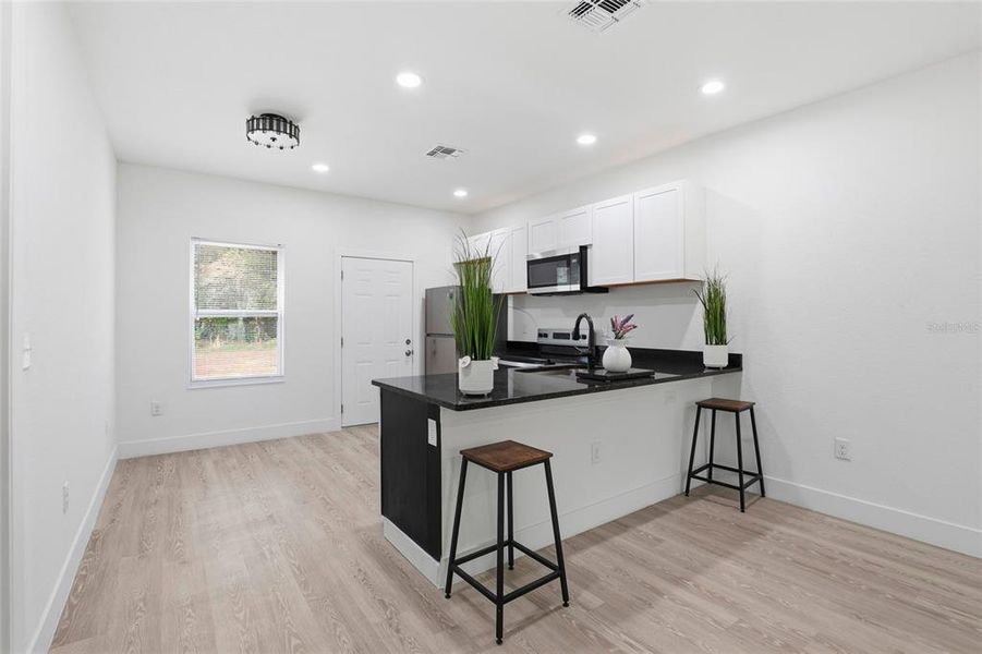 Furnished interior view inside a new home in , Interlachen (Image 8).