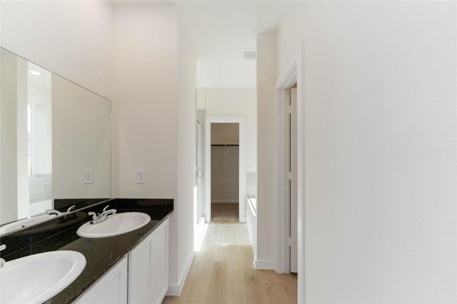 Furnished interior view inside a new home in Granger Pines, Conroe (Image 10).