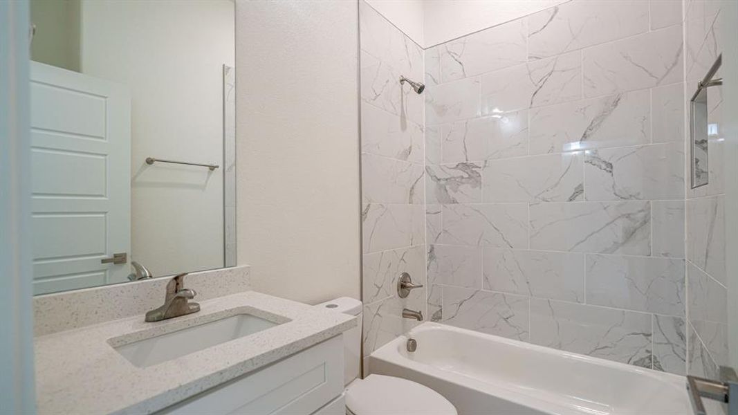 Second bathroom with shower/tub combo